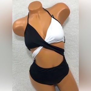 Black and white rare one piece strappy swimsuit